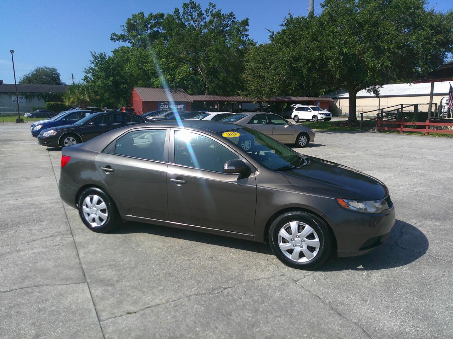 2010 GOLD KIA FORTE EX; LX (KNAFU4A25A5) , located at 390 Hansen Avenue, Orange Park, FL, 32065, (904) 276-7933, 30.130497, -81.787529 - Photo#2